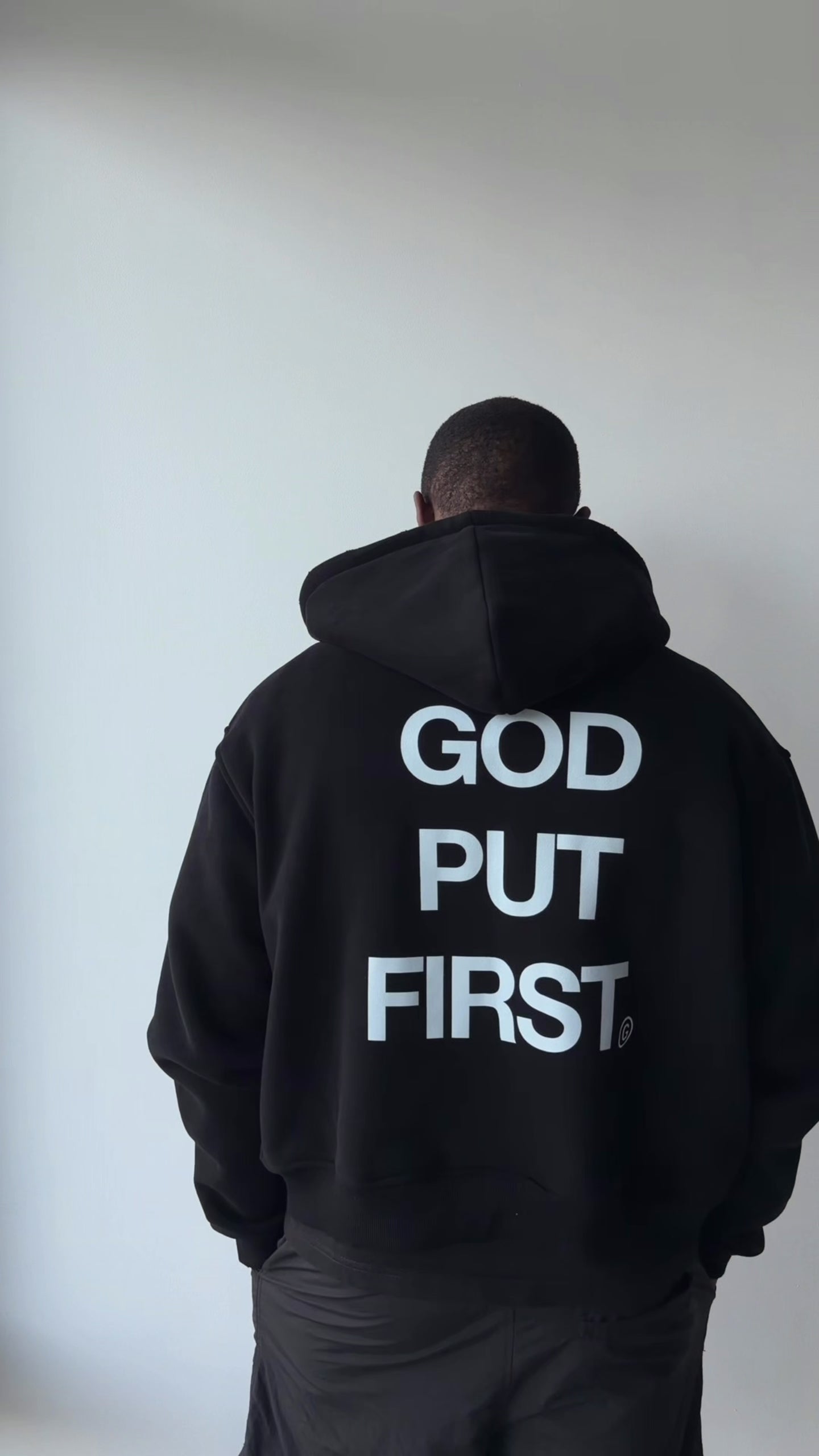 the 'Put God First' zip-up